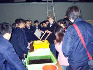 Jane demonstrating paper making to Junior High students