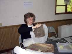 Jane removing paper from pellen