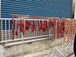 salted pork hanging out to dry