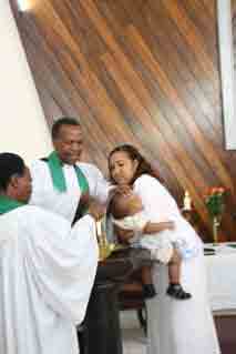 Roni O being baptised