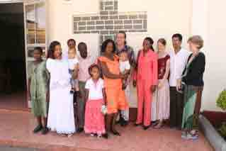 Group shot of family and friends in front of the church