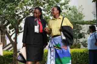 Lady with Conga skirt with Bush on it