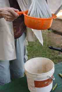 Jane squeezing okhra